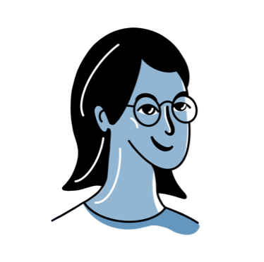 A woman with glasses smiling